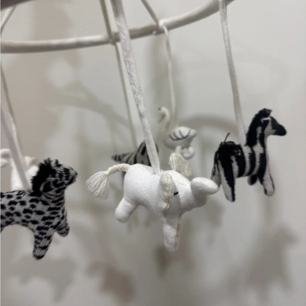 Crate & Barrel Baby Nursery safari animals mobile crib decor newborn neutral